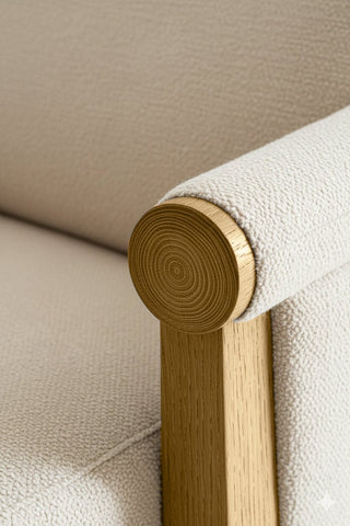 Close-up of Golden Wheat premium wood stain on a wooden chair frame