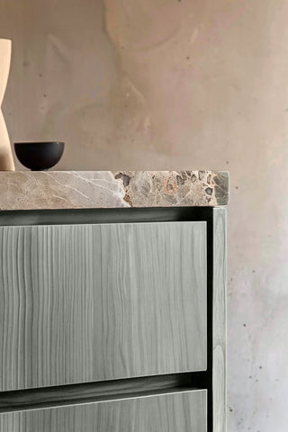 Close-up of Silver Moon premium wood stain on a fluted bathroom vanity