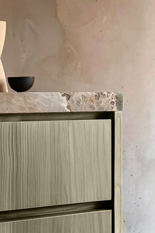 Close-up of Cinder Fawn premium wood stain on a fluted bathroom vanity