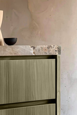 Close-up of Clouded Pine premium wood stain on a fluted bathroom vanity