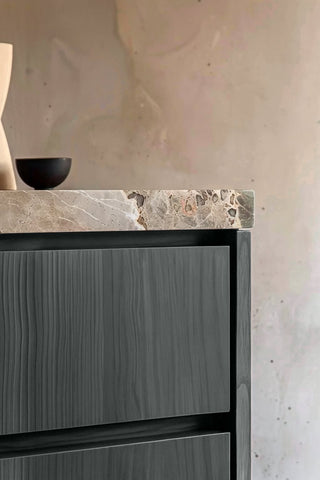 Close-up of Soft Charcoal premium wood stain on a fluted bathroom vanity