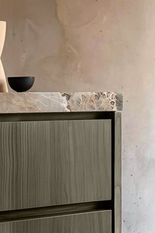 Close-up of Plush Truffle premium wood stain on a fluted bathroom vanity