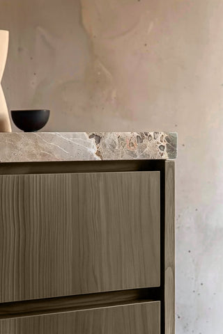 Close-up of Pine & Oak premium wood stain on a fluted bathroom vanity