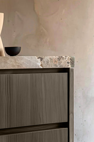 Close-up of Dark Whiskey premium wood stain on a fluted bathroom vanity